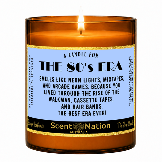 1980s nostalgia gifts – The 80's Era candle: lit Large 285 g soy candle in an amber jar, label reads 'Smells like neon lights, mixtapes and arcade games', Scent Nation Australia