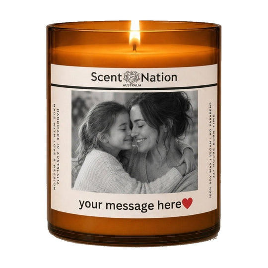 Photo candle – personalise with your own picture and message: lit Large 285 g amber soy candle with a black-and-white mother and daughter photo and 'your message here', Scent Nation Australia
