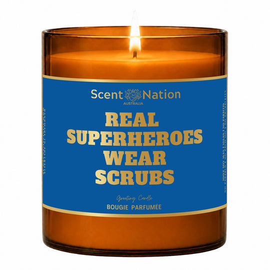 Gifts for nurses and doctors – lit Large 285 g amber soy candle with a royal-blue metallic label: Real superheroes wear scrubs, Scent Nation Australia
