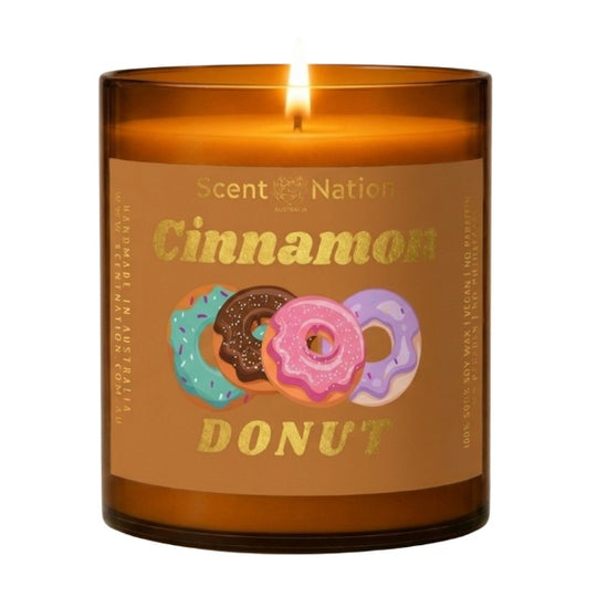 Cinnamon candles: Cinnamon Donut scented soy candle in a Large 285g amber jar, caramel-brown label with gold lettering and iced donuts, Scent Nation Australia