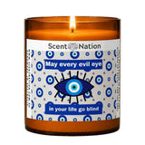 Rude gifts Australia – The Evil Eye Candle, a Scent Nation hand-poured soy candle in an amber jar with its printed label, Australia