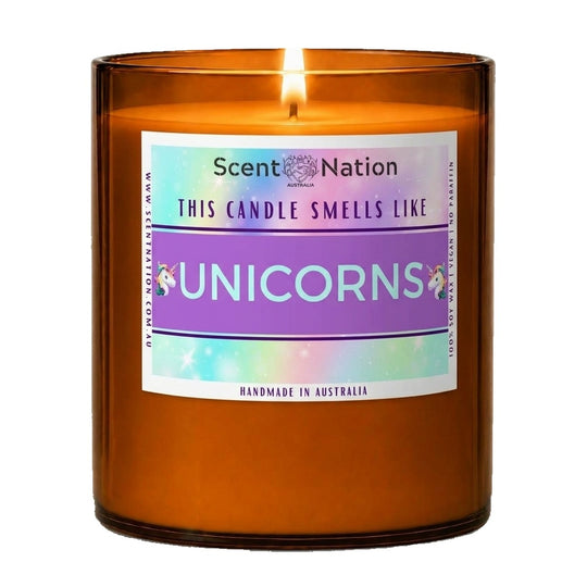 Gifts for book lovers: This Candle Smells Like Unicorns fantasy candle, Large amber soy jar with a pastel holographic label and two unicorn heads, Scent Nation Australia