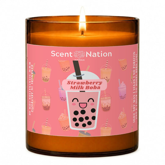 Scented candles: Strawberry Milk Boba soy candle in a Large 285g amber jar with a pink label and a smiling strawberry bubble tea cup, Scent Nation Australia
