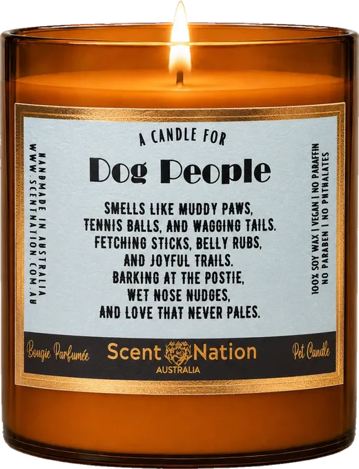 Birthday gifts from the dog – the Dog People birthday candle, a Large 285g amber soy candle with a black-band label celebrating muddy paws, tennis balls and wagging tails
