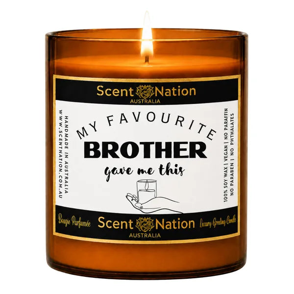 Gift from brother – My Favourite Brother Gave Me This candle, black label with gold border and gold lettering on a lit Large amber jar soy candle by Scent Nation Australia