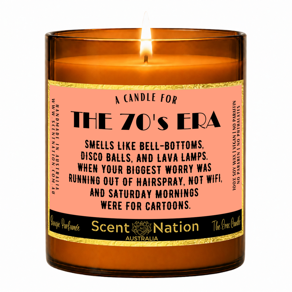 1970s nostalgia gifts – The 70's Era candle: lit Large 285 g soy candle in an amber jar with a gold-trim 'A candle for the 70's era' label, Scent Nation Australia