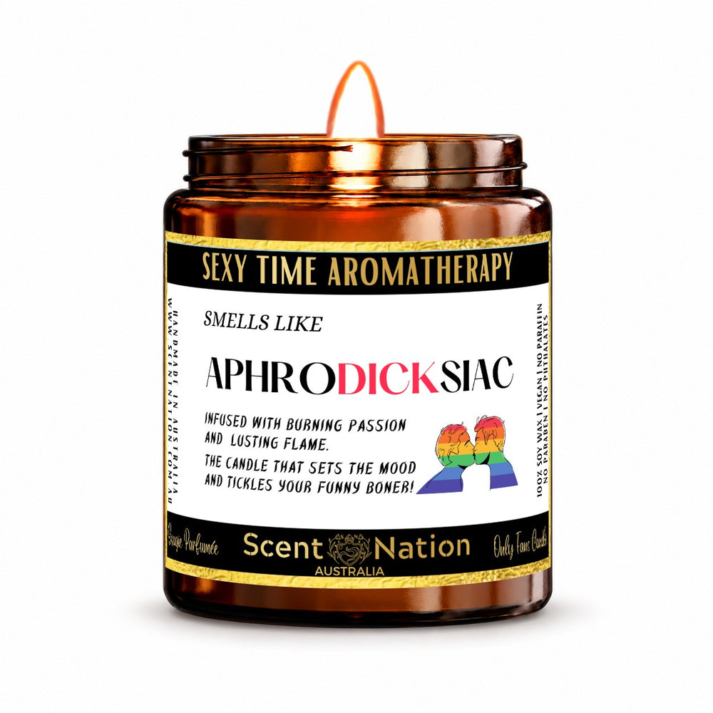 Gay couple gift – Aphrodicksiac Pride Edition candle: lit Medium 225 g amber soy candle with a Sexy Time Aromatherapy label and rainbow couple, Scent Nation Australia