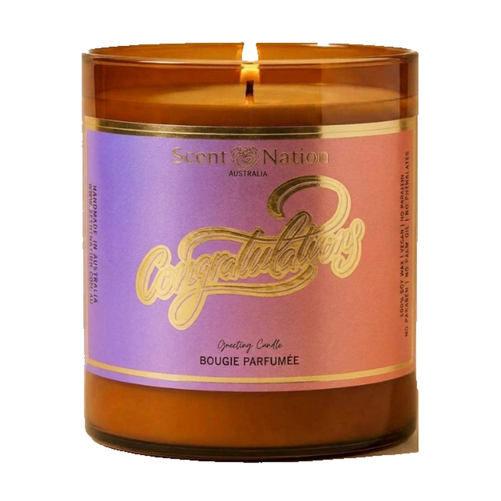 Congratulations gift – Congratulations greeting candle: lit Large 285 g amber soy candle with a lilac-to-coral label and gold-foil Congratulations script, Scent Nation Australia