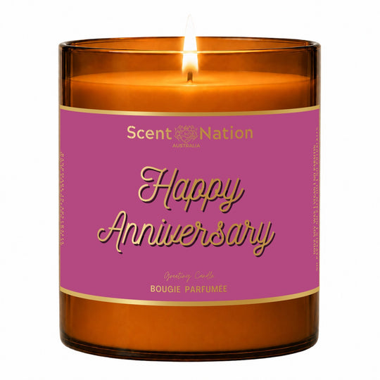 Anniversary gift for her – Happy Anniversary greeting candle: lit Large 285 g amber soy candle with a magenta metallic label and gold-foil script, Scent Nation Australia