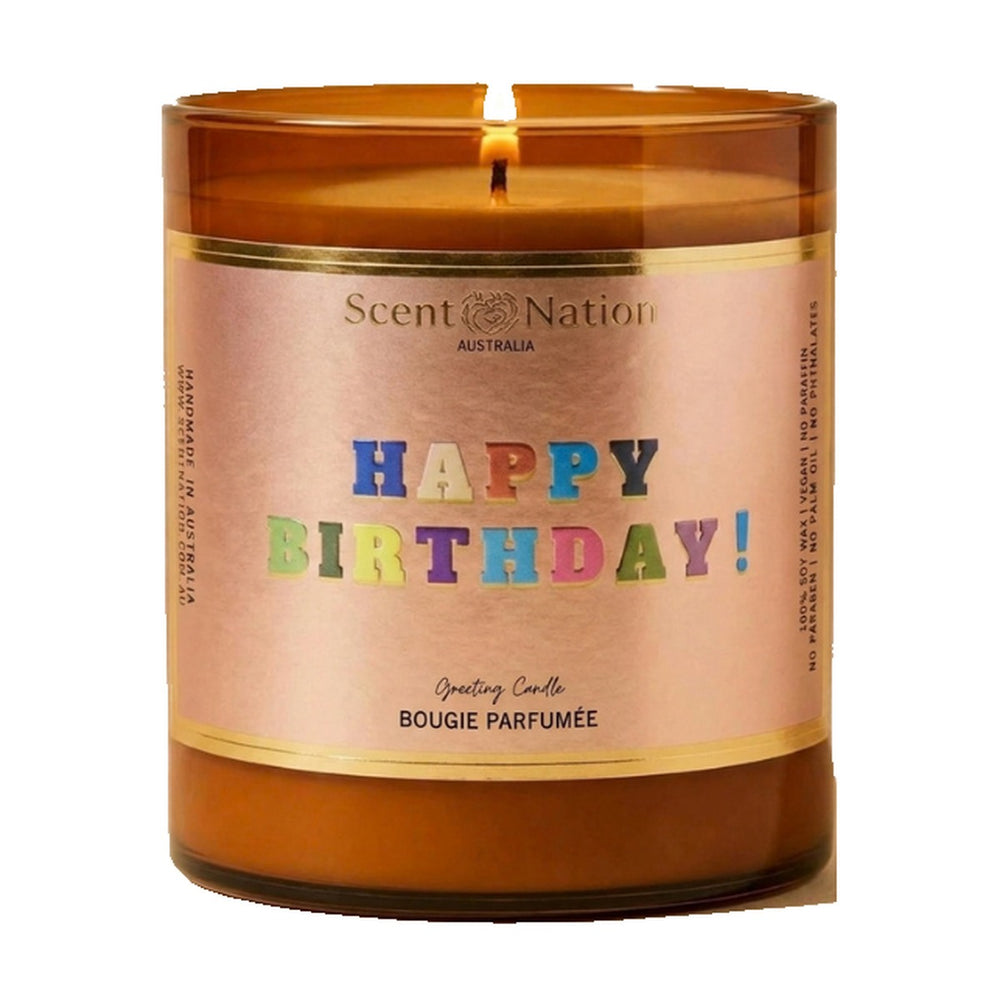 Happy birthday candle gift – lit Large 285 g amber soy candle with a blush-pink label and colourful foil Happy Birthday lettering, Scent Nation Australia