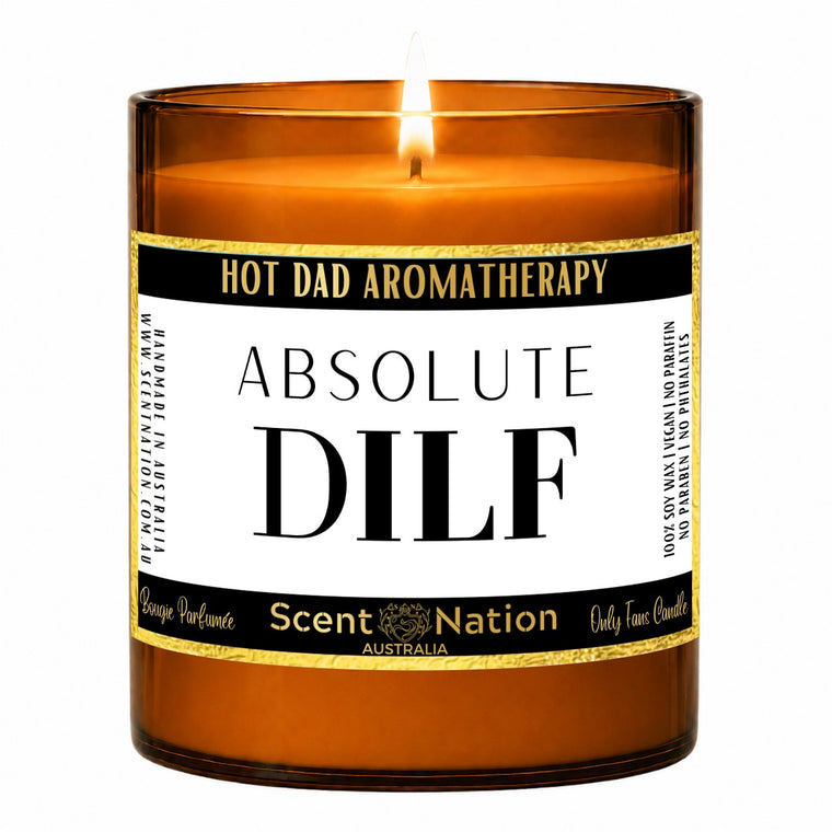 Funny gifts for new dads – Absolute to DILF, a Large 285g amber soy candle with a black-band Hot Dad Aromatherapy label in bold white serif lettering
