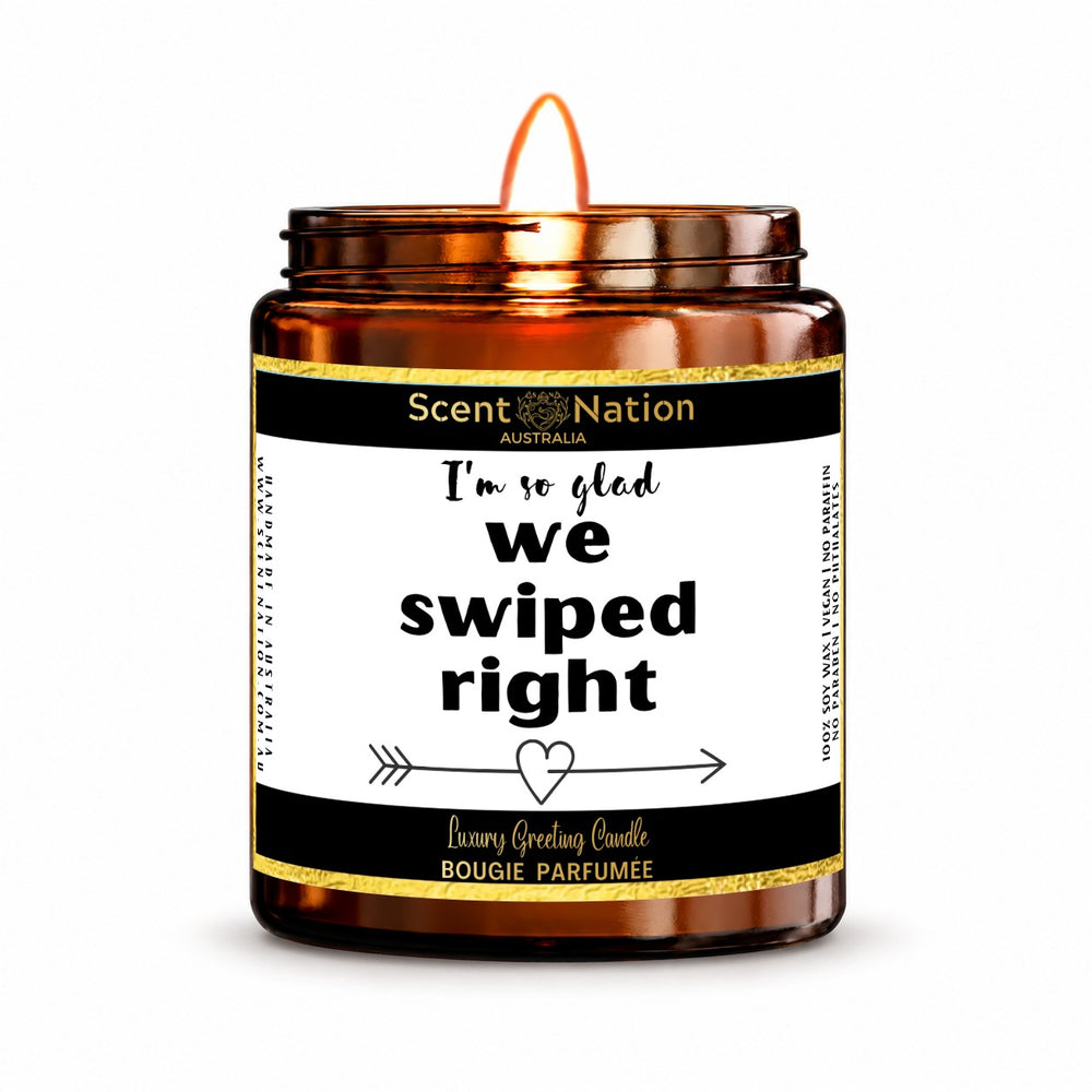 Dating app couple gift – I’m so glad we swiped right candle: lit Medium 225 g amber soy candle with a white label and gold trim, Scent Nation Australia