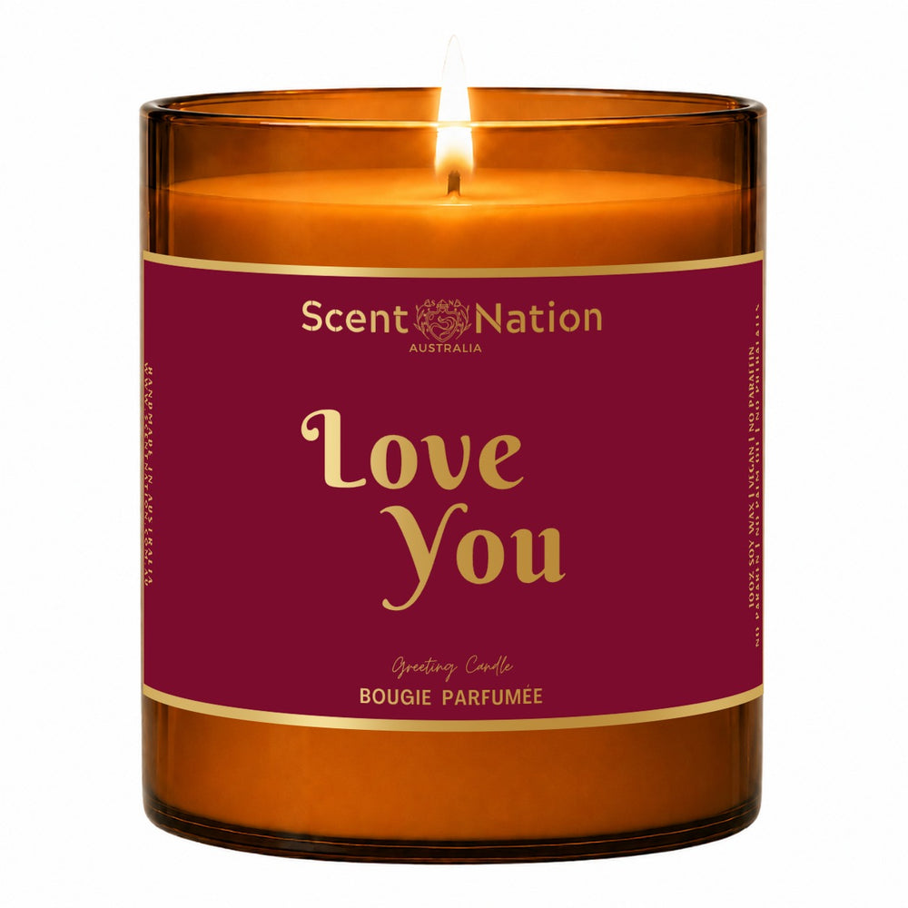 Love you candle gift – lit Large 285 g amber soy candle with a burgundy metallic label and gold-foil Love You lettering, Scent Nation Australia