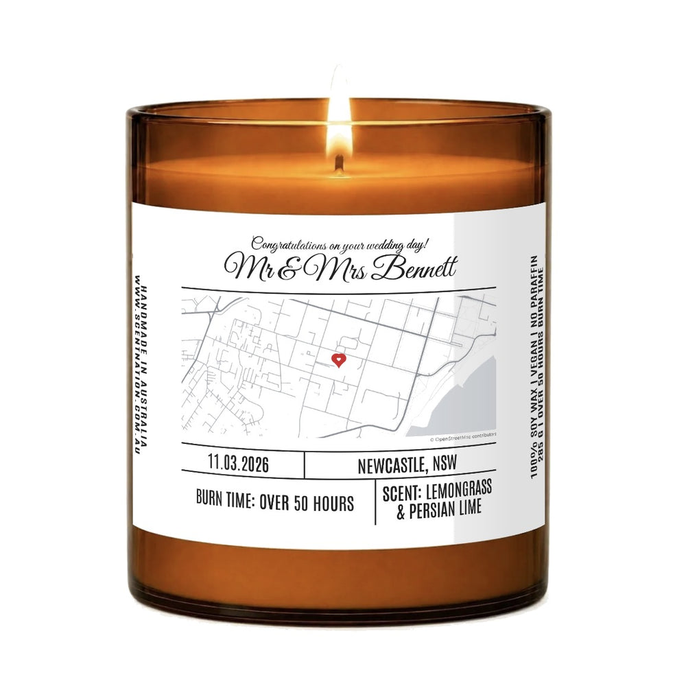 Personalised map candle for weddings and engagements – lit Large 285 g amber soy candle with a street map, Mr & Mrs Bennett, 11.03.2026 and Newcastle NSW on a white label, Scent Nation Australia