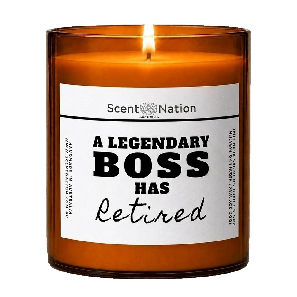 Boss retirement gifts: A Legendary Boss Has Retired candle, Large 285g amber soy jar with a white label in bold black type and Retired in script, Scent Nation Australia