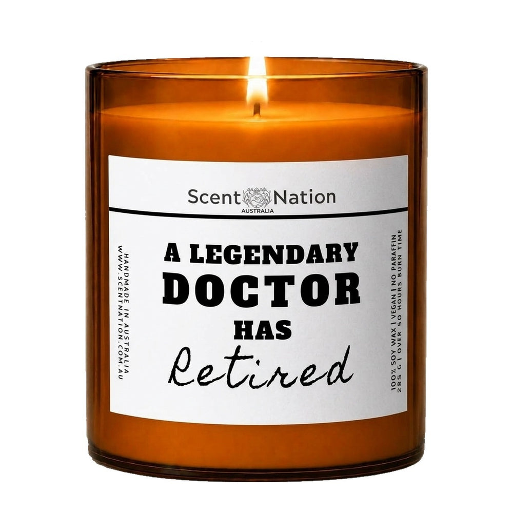 Doctor retirement gifts: A Legendary Doctor Has Retired candle, Large 285g amber soy jar with a white label in bold black type and Retired in script, Scent Nation Australia