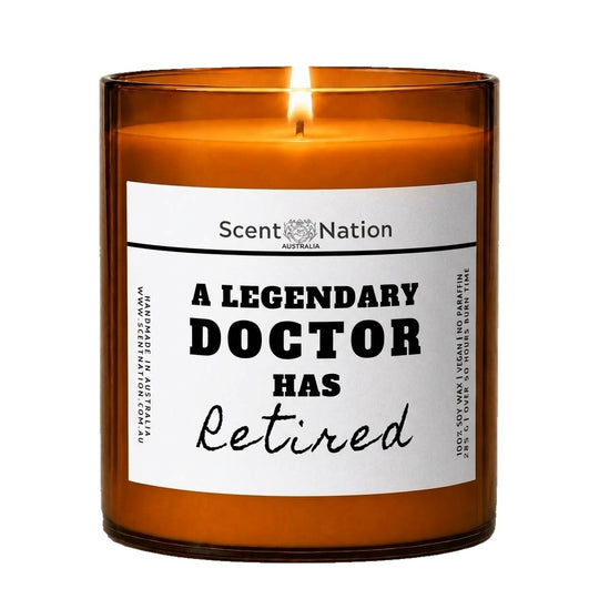 Doctor retirement gifts: A Legendary Doctor Has Retired candle, Large 285g amber soy jar with a white label in bold black type and Retired in script, Scent Nation Australia
