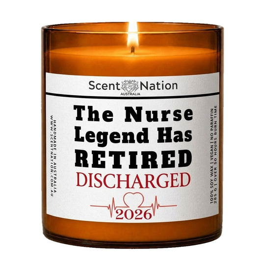 Nurse retirement gifts: The Nurse Legend Has Retired candle, Large 285g amber soy jar with a white label, red Discharged and a heartbeat line, Scent Nation Australia