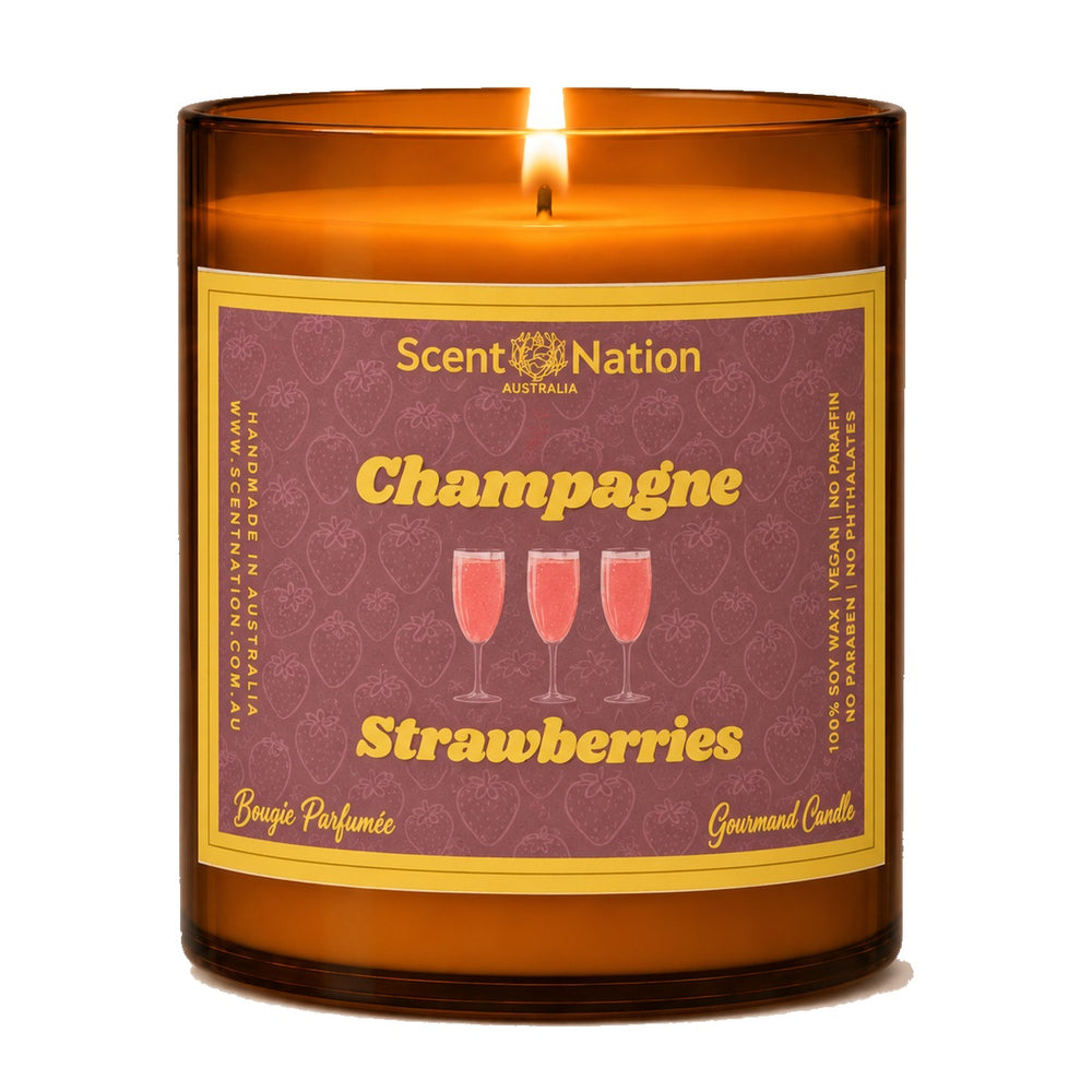 Champagne scented candle: Champagne & Strawberries soy candle in a Large 285g amber jar with a berry-pink label and three champagne flutes, Scent Nation Australia
