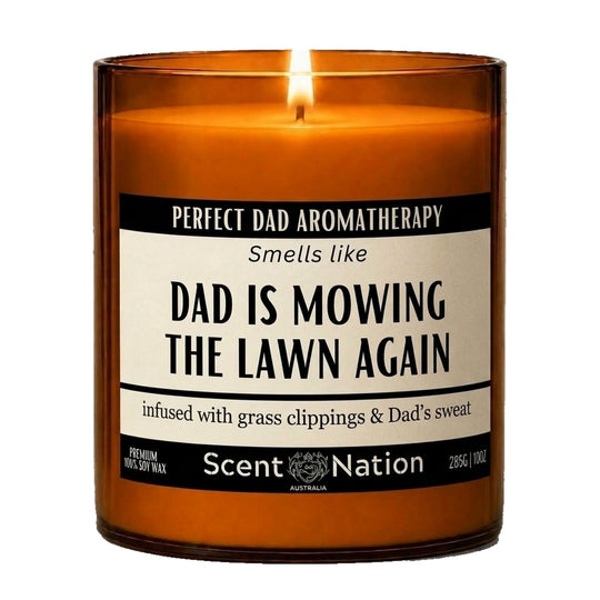 Gifts for dad: Perfect Dad Aromatherapy lawn mower candle, Large 285g amber soy jar with a cream and black label reading Smells Like Dad Is Mowing the Lawn Again, Scent Nation Australia