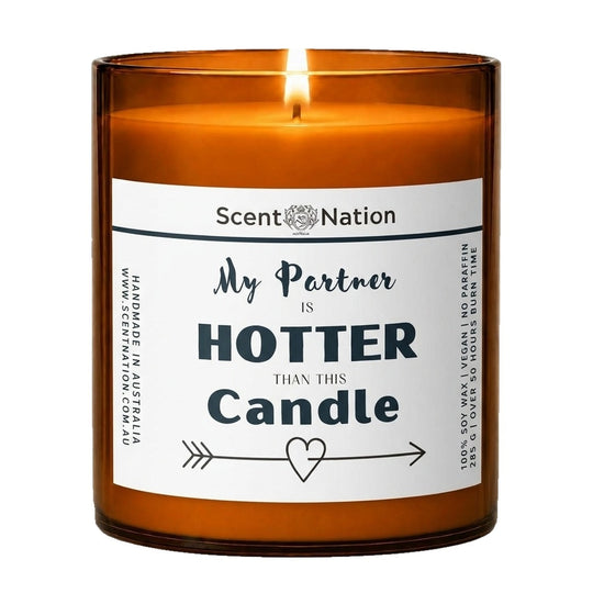 Anniversary gifts: My Partner Is Hotter Than This Candle, Large 285g amber soy jar with a white label, script and bold lettering and an arrow-and-heart line, Scent Nation Australia