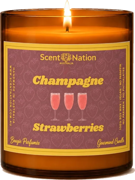 Strawberry scented candles – Champagne & Strawberries soy candle in a Large 285g amber jar with a raspberry-red label, three pink champagne flutes and gold lettering