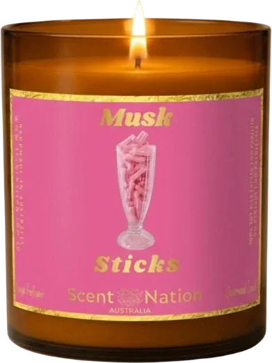 Musk candles – Musk Sticks scented soy candle in a Large 285g amber jar with a hot-pink label, a pink milkshake glass and gold lettering, the classic Aussie lolly