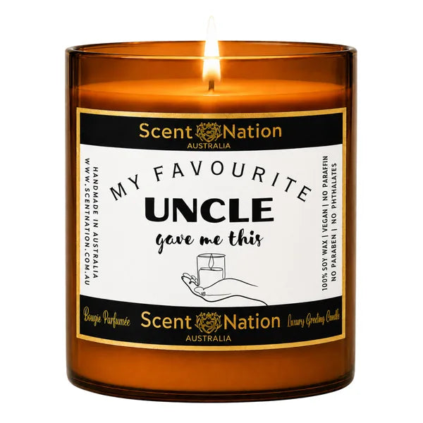 Gift from uncle to niece or nephew – My Favourite Uncle Gave Me This candle, black label with gold border on a lit Large amber jar soy candle, Scent Nation Australia
