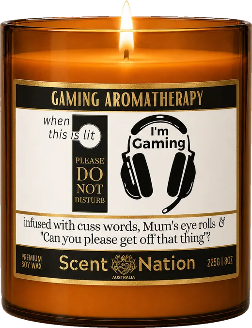 Funny birthday gifts for gamers – The Gamer Candle, a Large 285g amber soy candle with a Gaming Aromatherapy label, headphones and “When this is lit, please do not disturb”